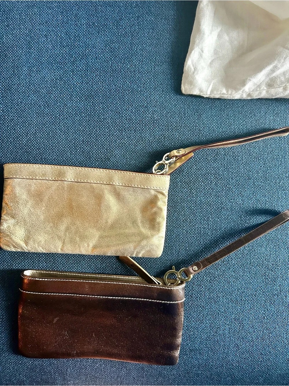 Kate Spade Gold and Bronze Leather Wristlet Duo